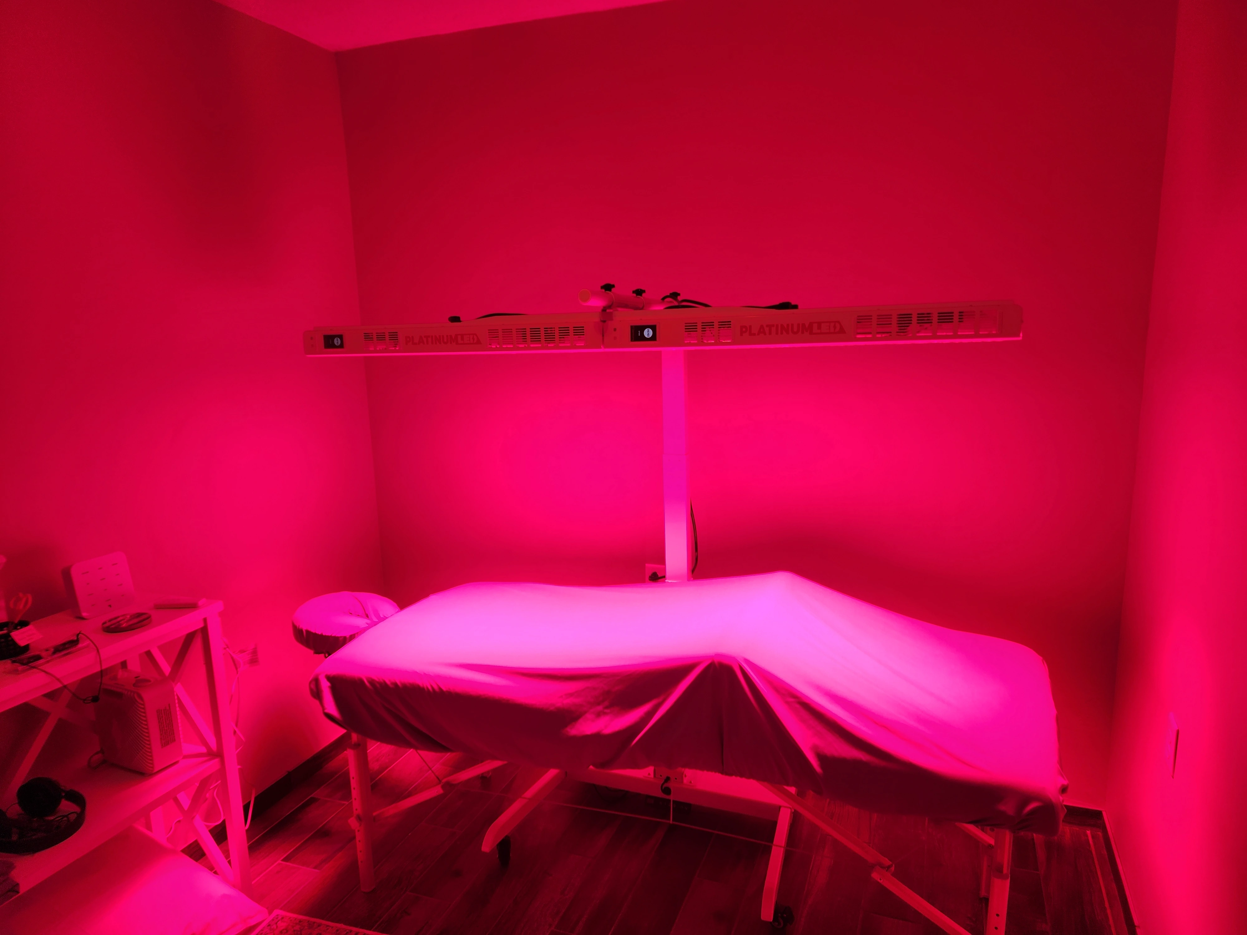An image of a red light therapy bed